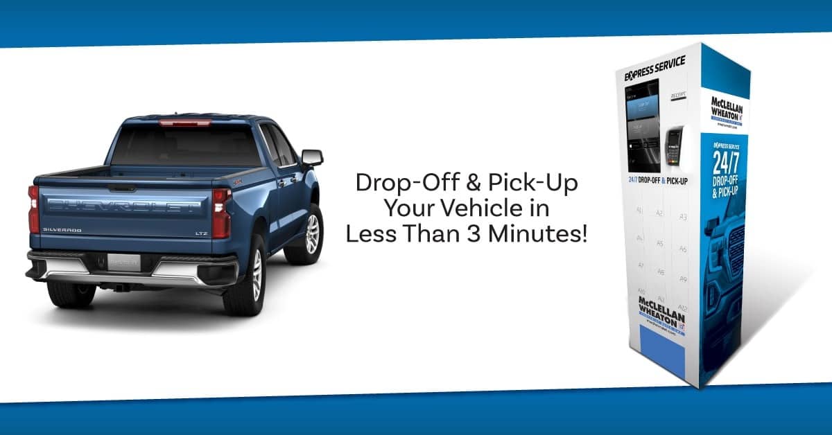 Blue Chevrolet Silverado next to express service kiosk for fast vehicle drop-off and pick-up in under 3 minutes.
