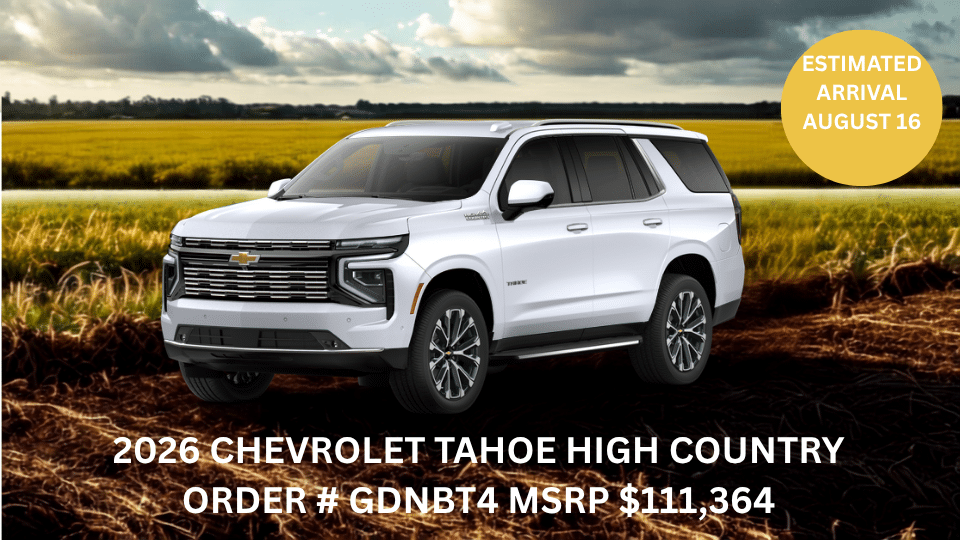 White 2026 Chevrolet Tahoe High Country SUV in a field, arriving August 16. MSRP $111,364.